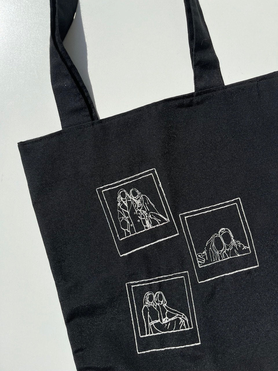 TOTE BAG EM PRETO COM FOTOGRAFIAS POLAROID